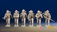 WW2 British Commandos in cap comforters advancing, front view