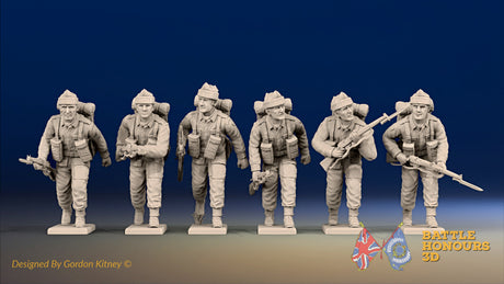 WW2 British Commandos in cap comforters advancing, front view