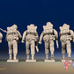WW2 British Commandos in cap comforters advancing, rear view