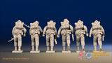 WW2 British Commandos in cap comforters advancing, rear view