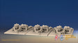 WW2 British Commando Bren gun teams in cap comforters firing prone, front view