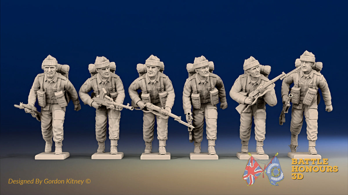 WW2 British Commandos in cap comforters with Bren guns advancing, front view