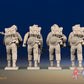 WW2 British Commandos in cap comforters with Bren guns advancing, rear view
