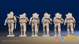 WW2 British Commandos in cap comforters with Bren guns advancing, rear view
