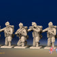 WW2 British Commandos in cap comforters kneeling, front view