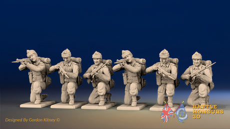 WW2 British Commandos in cap comforters kneeling, front view