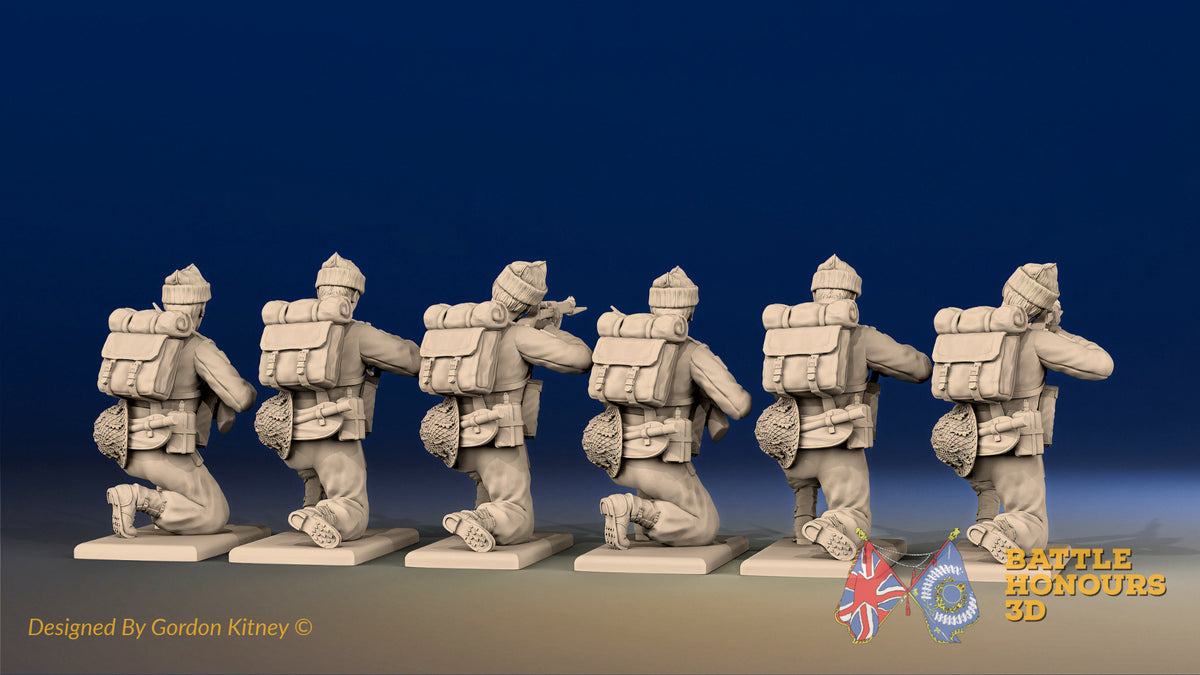WW2 British Commandos in cap comforters kneeling, rear view