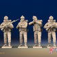 WW2 British Commandos in cap comforters standing firing, front view