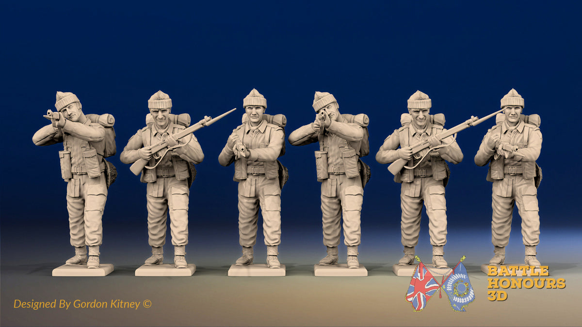 WW2 British Commandos in cap comforters standing firing, front view