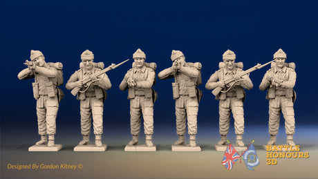 WW2 British Commandos in cap comforters standing firing, front view