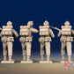 WW2 British Commandos in cap comforters standing firing, rear view