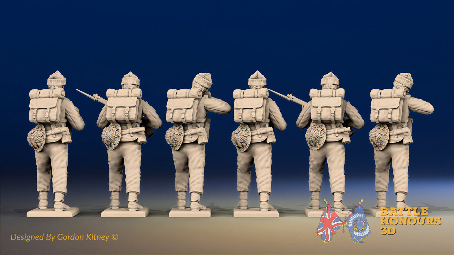 WW2 British Commandos in cap comforters standing firing, rear view