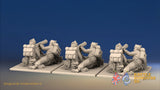 WW2 British Commando Vickers machine gun teams in cap comforters, rear view