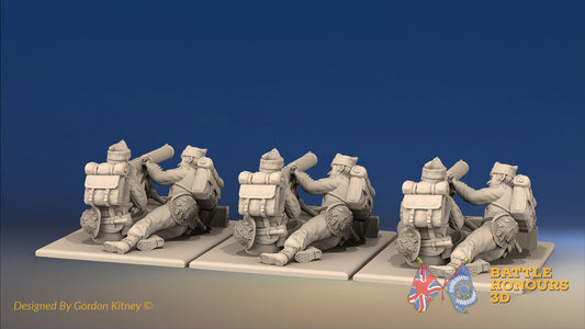 WW2 British Commando Vickers machine gun teams in cap comforters, rear view