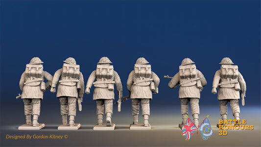 British Commando Bren gun team advancing in smocks rear view