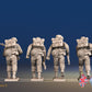 Royal Marine Commandos advancing in battle dress rear view
