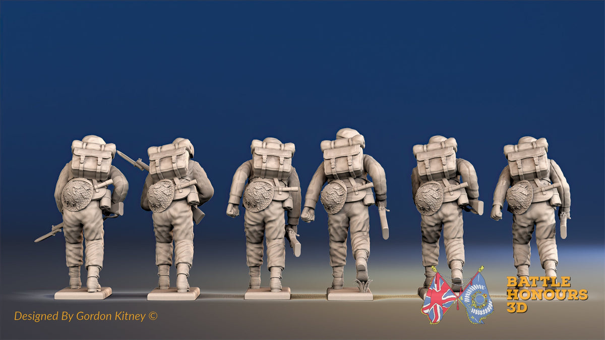 Royal Marine Commandos advancing in battle dress rear view