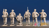 Royal Marine command in battle dress rear view