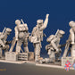 Royal Marine mortar team in battle dress rear view