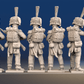 Napoleonic French elite Voltigeurs loading and firing in colpack rear view